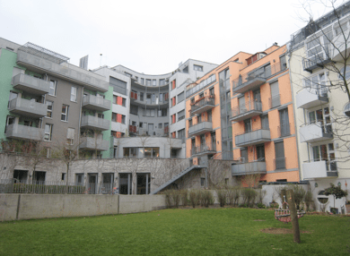 Eco-quartier de Tübingen: Cœur d’îlot, salle commune visible au rez de chaussée 